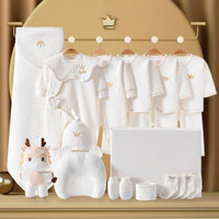 Coffret naissance bébé 20 pièces NounaBaby avec vêtements en coton blanc, peluche, bonnet, couverture et boîte cadeau luxe – Idéal à offrir à Dakar.