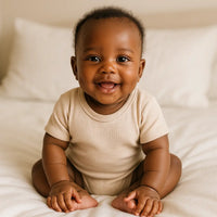 Bébé africain portant un body 100% coton – vêtements bébé Dakar – NounaBaby