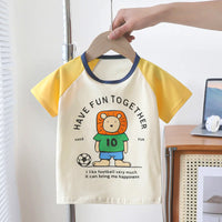 T-shirt enfant lion footballeur, manches jaunes – Bambinerie Dakar