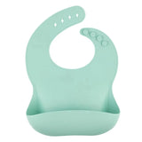 Bavoir bébé en silicone vert menthe avec poche récupératrice – NounaBaby Dakar