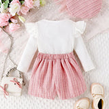 Tenue bébé fille rose clair 2-3 ans avec haut à volants et short rayé – boutique NounaBaby Sénégal