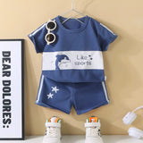 Ensemble enfant bleu blanc motif dessin Dakar