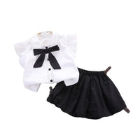 ensemble noir blanc avec nœud fille de la boutique nounababy Dakar Senegal