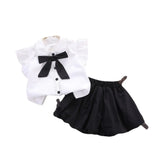 ensemble noir blanc avec nœud fille de la boutique nounababy Dakar Senegal