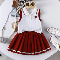 Ensemble fille 2 pièces polo sans manches jupe plissée bordeaux vêtement enfant Dakar Sénégal