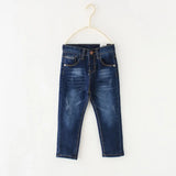 Jean garçon en coton doux bleu foncé, modèle chic NounaBaby à Dakar.