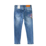 Vue arrière du jean fille denim bleu clair avec broderie – NounaBaby Sénégal.