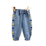 Jean fille en denim élastique motifs cœurs et fleurs – NounaBaby Sénégal.