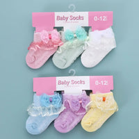 Chaussettes bébé fille rose avec nœud papillon et dentelle à Dakar