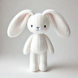 Peluche lapin blanc ultra doux pour bébé, parfaite pour les câlins et l’éveil sensoriel, disponible chez NounaBaby à Dakar