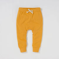 Pantalon bébé coton bio jaune moutarde avec nœud en coton