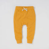 Pantalon bébé coton bio jaune moutarde avec nœud en coton