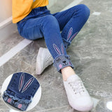 Pantalon jean enfant fille bleu denim motif lapin – Sénégal
