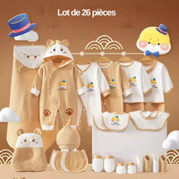 Détail des 26 pièces du coffret naissance : combinaisons, bonnet, coussin tête, bavoirs, moufles, couverture – coffret complet pour nouveau-né à Dakar.