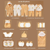 Détail des 26 pièces du coffret naissance : combinaisons, bonnet, coussin tête, bavoirs, moufles, couverture – coffret complet pour nouveau-né à Dakar.