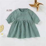 Robe bébé fille mousseline coton biologique vert sauge coupe en A NounaBaby Dakar