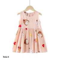 Robe enfant motif visage de fille et cœurs – Rose pastel – Boutique Dakar