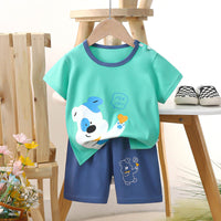ensemble pour bébé et enfant chez nounababy Dakar Sénégal , motif animal de couleur t-shirt vert et short bleu