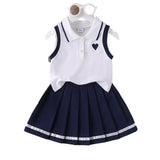 Ensemble fille polo blanc jupe plissée bleue marine style preppy boutique enfant Dakar NounaBaby