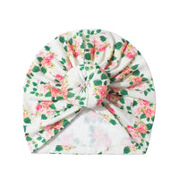 Turban bébé fille blanc à fleurs roses – Mode bébé Sénégal